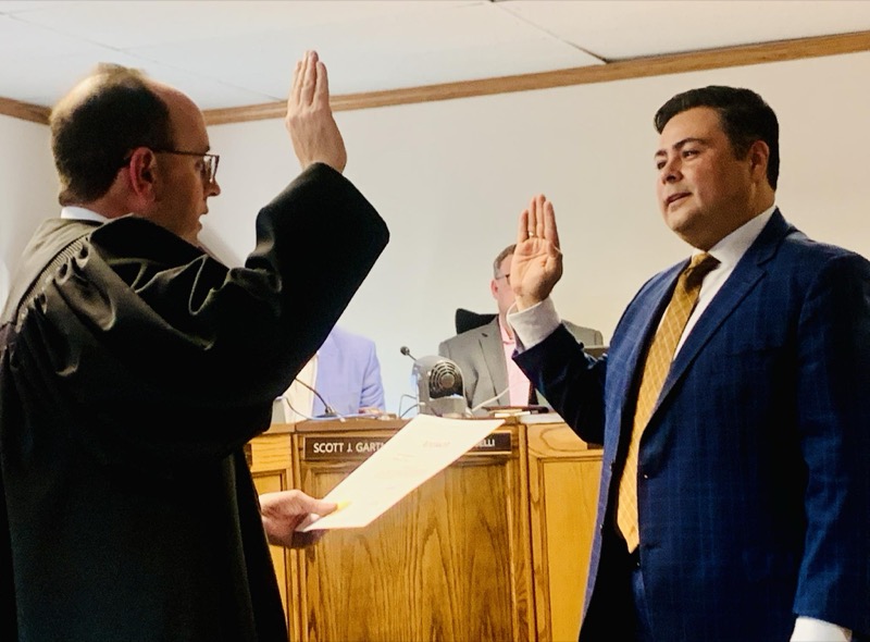 Jose Martinez being sworn in at a Lake County government ceremony